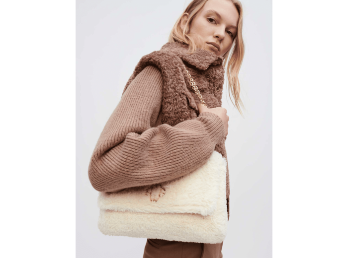Blouson en fausse fourrure et maille