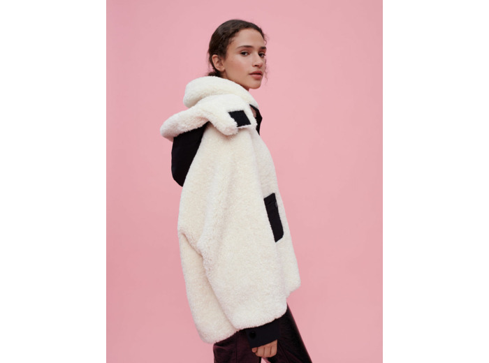 Manteau en fausse fourrure et vinyle