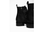 Bottines plates motif clover et studs