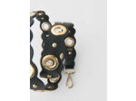 Bandoulière en cuir à oeillets et studs