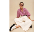 Pantalon large à boutons latéraux