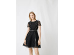 Robe patineuse à œillets et studs