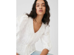 Top à broderies resserré à la taille