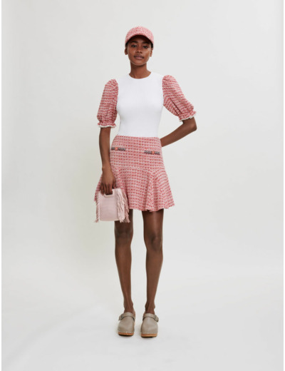 Pull en maille et manches en tweed