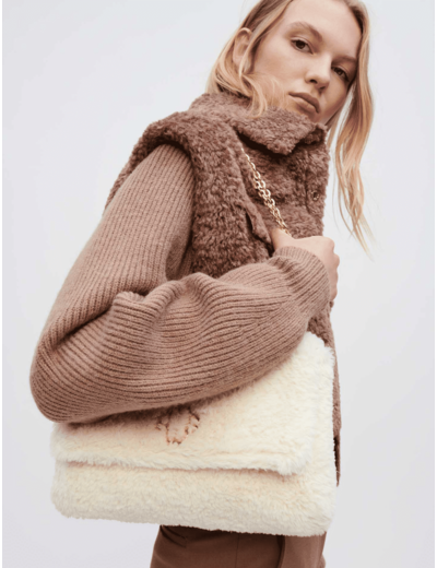 Blouson en fausse fourrure et maille