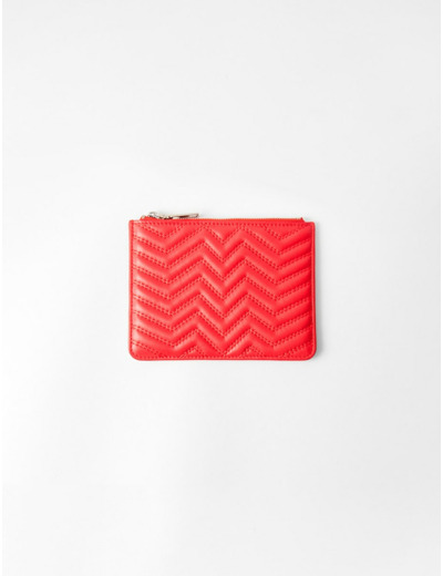 Pochette zippée en cuir matelassé