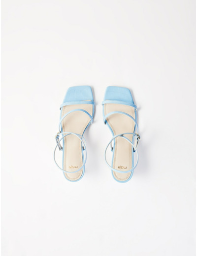 Mules à talons midi en cuir embossé