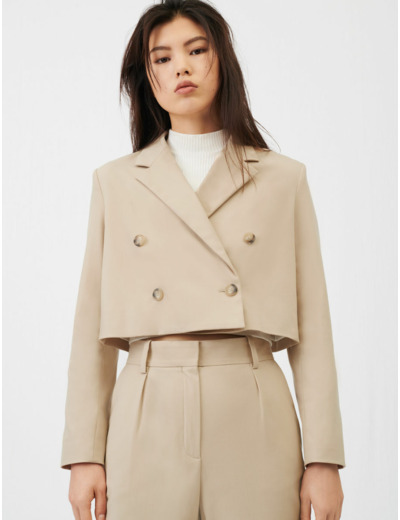 Veste de costume beige courte et croisée