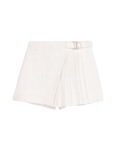 Jupe short plissée en tweed
